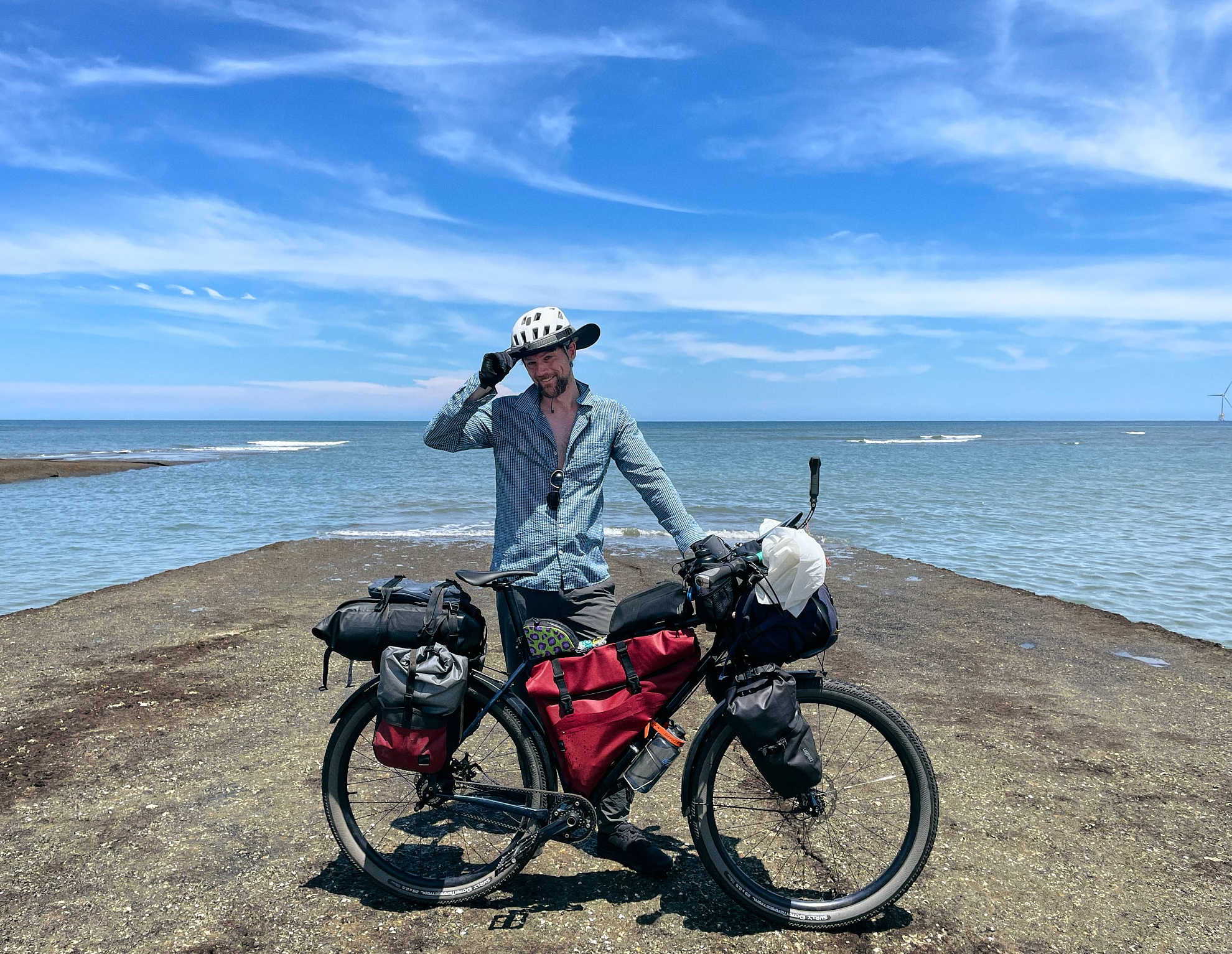 Me tipping my oversize bike hat